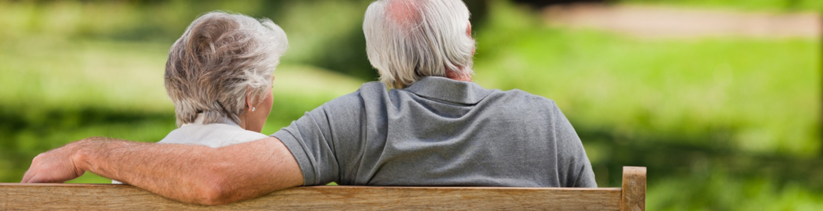 3631925-couple-sitting-on-the-bench-with-their-back-to-the-camera.jpg