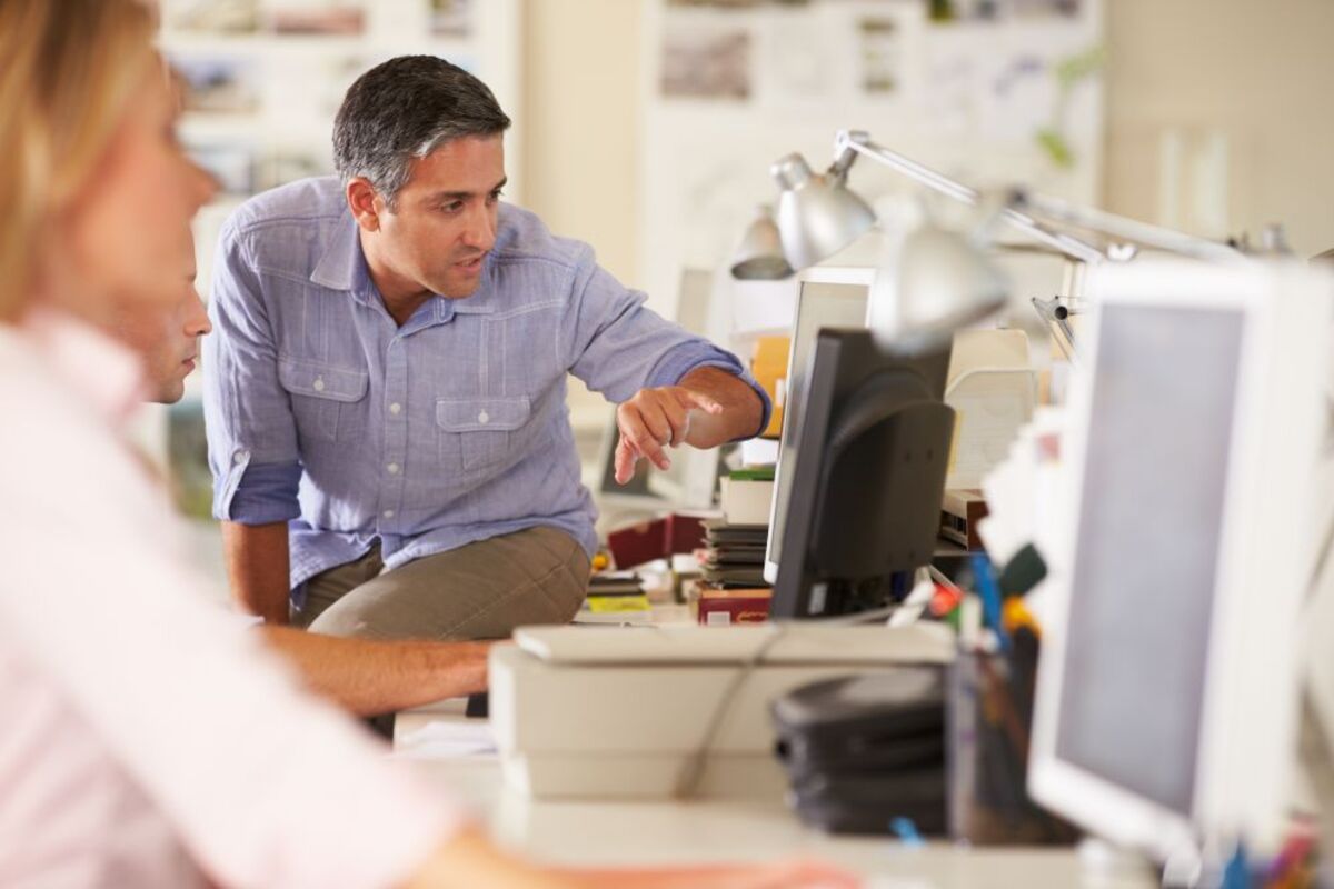 workers-at-desks-in-busy-creative-office-2023-11-27-05-15-46-utc.jpg